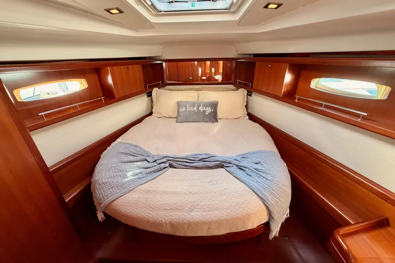 Slide: The Image of Luxurious cabin interior of a 2007 Beneteau 49 yacht with cozy bedding. - 86