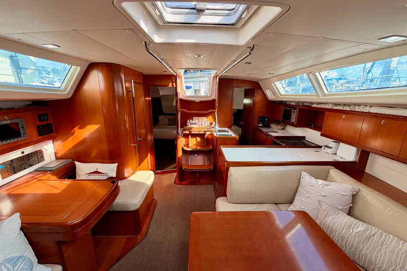 Slide: The Image of Luxurious interior of 2007 Beneteau 49 yacht with wood finish and modern amenities. - 93