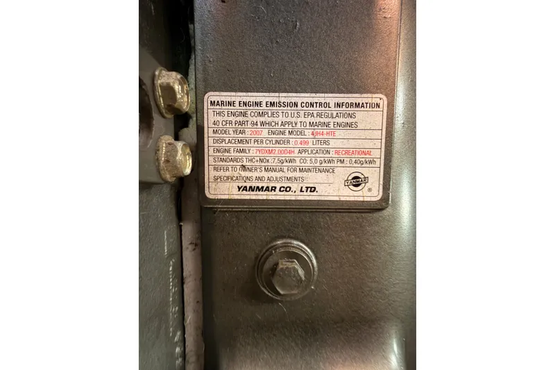 Slide: The Image of Marine engine emission control label on a 2007 Beneteau 49, Yanmar model 4JH4-HTE. - 96