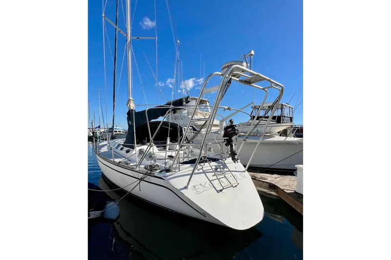 Slide: The Image of Sailboat docked in marina, 1986 Hunter Legend 45, clear blue sky. - 3