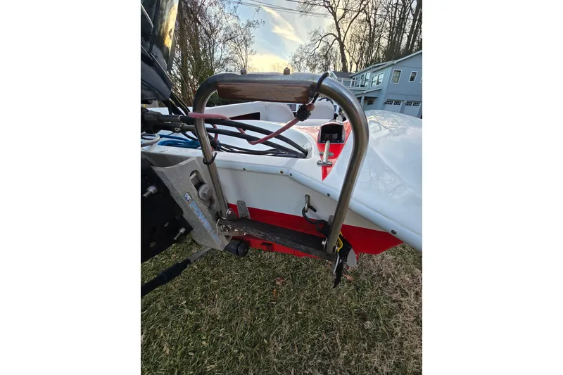 Slide: The Image of 1978 Allison Boats 20 with motor mount, parked on grass. - 23