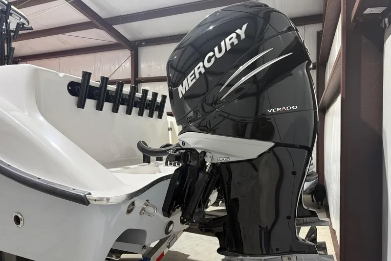 Slide: The Image of 2023 Cape Horn 34 XS boat with Mercury Verado outboard engine in a storage facility. - 20