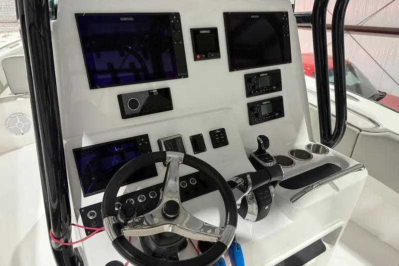 Slide: The Image of 2023 Cape Horn 34 XS boat dashboard with advanced navigation and control systems. - 22