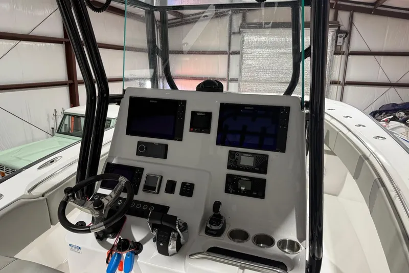 Slide: The Image of 2023 Cape Horn 34 XS boat dashboard with modern navigation and control systems. - 26