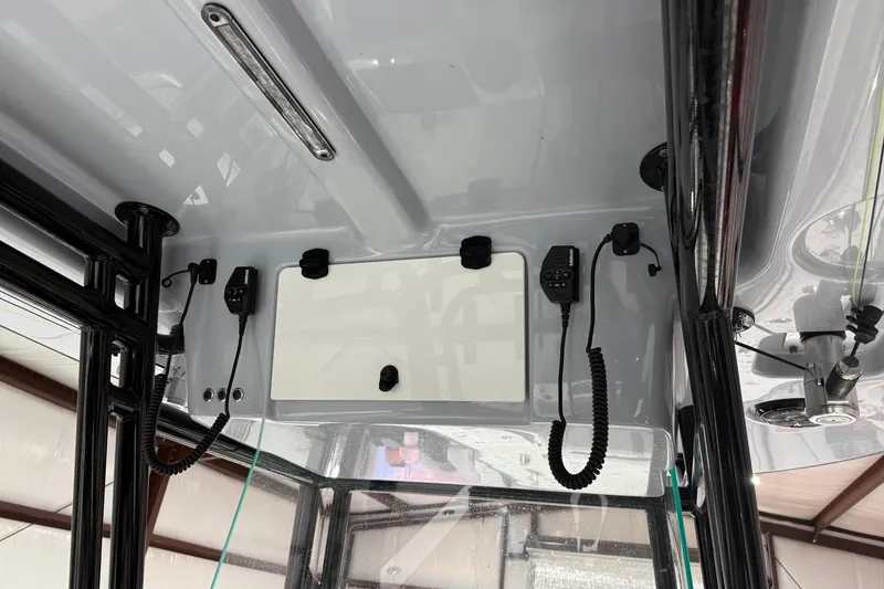 Slide: The Image of 2023 Cape Horn 34 XS boat interior with communication equipment and sleek design. - 30