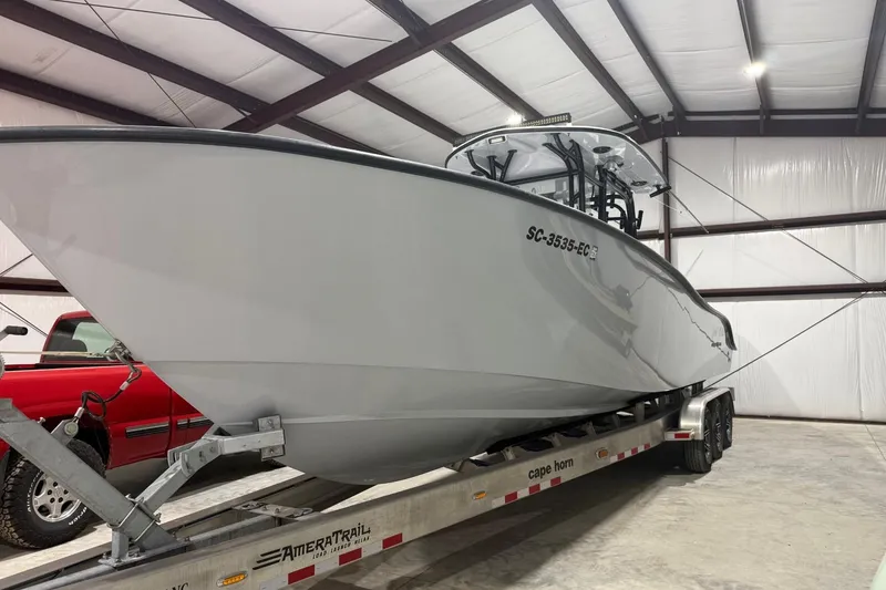 Slide: The Image of 2023 Cape Horn 34 XS boat on trailer in indoor storage facility. - 37