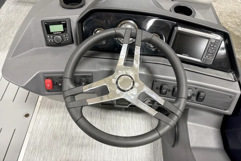 Slide: The Image of Steering console of 2026 Bennington 22 S1 Stern Radius with modern controls and display. - 10