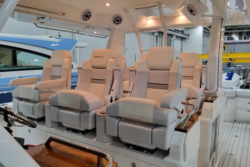 Slide: The Image of Luxurious seating on 2026 Formula 457 Center Console Fish boat, featuring plush, ergonomic design. - 30