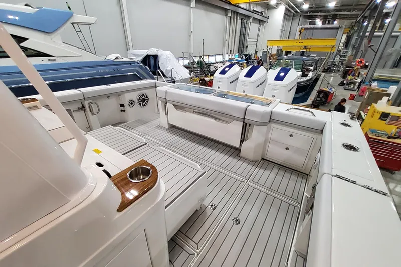 Slide: The Image of 2026 Formula 457 Center Console Fish boat interior in a manufacturing facility. - 31
