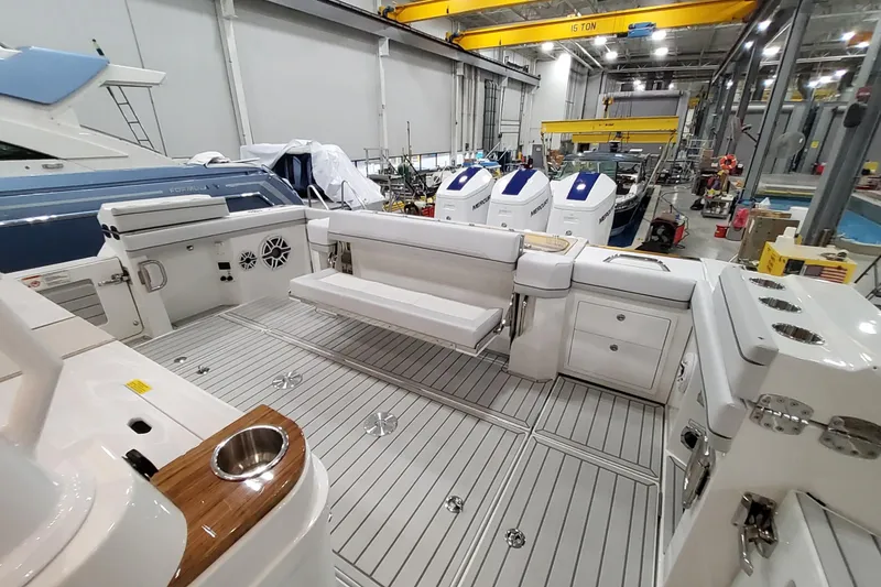 Slide: The Image of 2026 Formula 457 Center Console Fish boat interior in a manufacturing facility. - 38