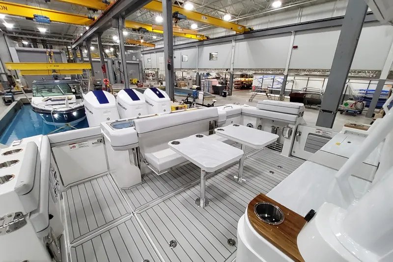 Slide: The Image of 2026 Formula 457 Center Console Fish boat interior in a manufacturing facility. - 41