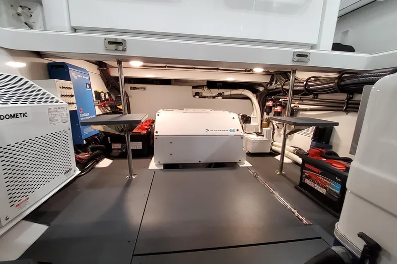 Slide: The Image of Engine room of 2026 Formula 457 Center Console Fish with advanced equipment and wiring. - 45