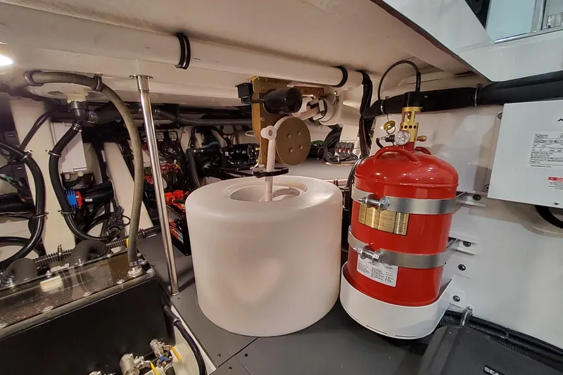 Slide: The Image of Engine room of 2026 Formula 457 Center Console Fish with fire extinguisher and equipment. - 46