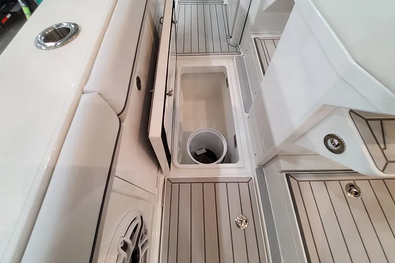 Slide: The Image of 2026 Formula 457 Center Console Fish boat interior with storage compartments and sleek design. - 57