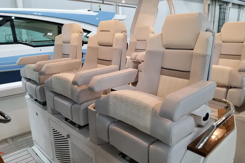 Slide: The Image of Luxurious seating on 2026 Formula 457 Center Console Fish boat, featuring plush, ergonomic design. - 58