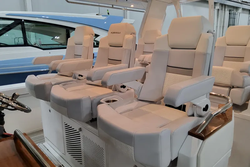 Slide: The Image of 2026 Formula 457 Center Console Fish boat with luxurious seating and modern design. - 59