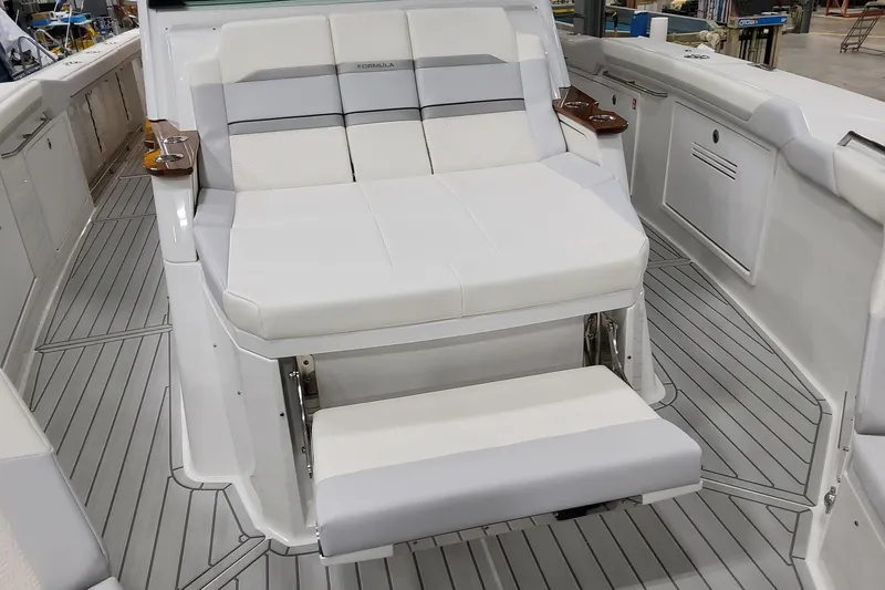 Slide: The Image of 2026 Formula 457 Center Console Fish boat with luxurious seating and sleek design. - 64