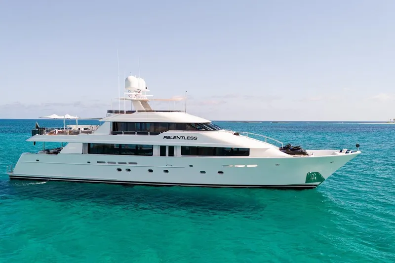The Image of 2006 Westport 130 Motoryacht cruising on clear turquoise waters. - 0