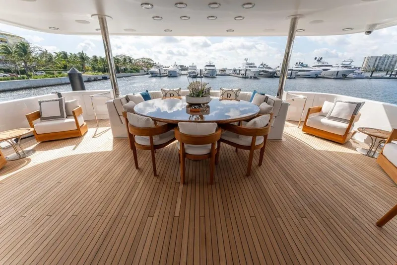 Slide: The Image of Luxurious 2006 Westport 130 Motoryacht deck with elegant seating and ocean view. - 18