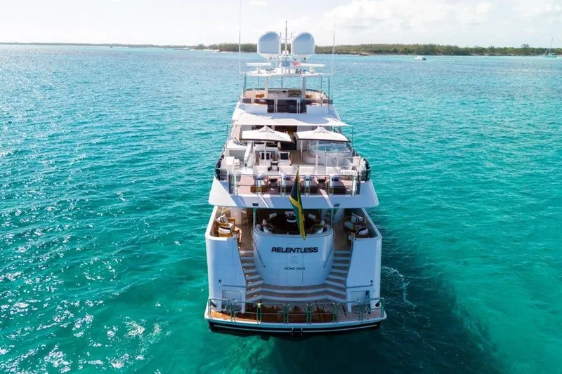 Slide: The Image of Luxury 2006 Westport 130 Motoryacht on turquoise ocean waters. - 2