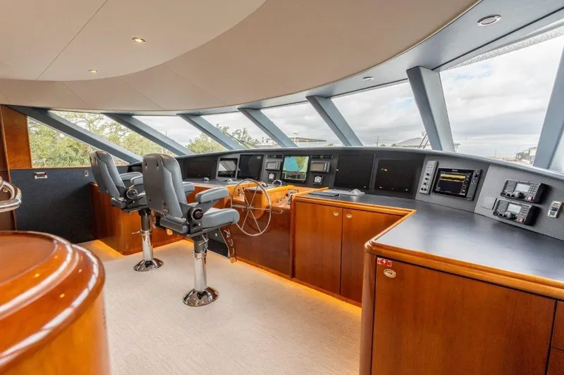 Slide: The Image of Luxurious helm of 2006 Westport 130 Motoryacht with modern navigation equipment. - 22