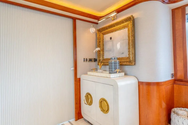 Slide: The Image of Luxurious interior of 2006 Westport 130 Motoryacht with elegant decor and framed artwork. - 27