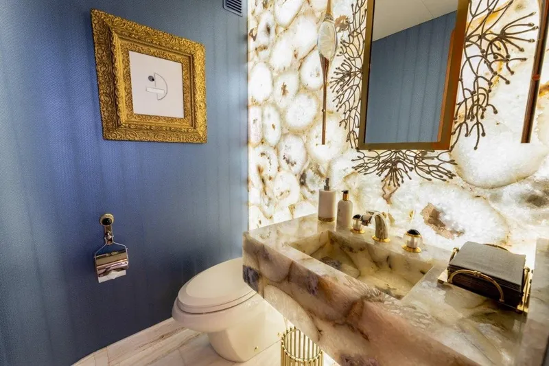 Slide: The Image of Luxurious bathroom on 2006 Westport 130 Motoryacht with elegant decor and marble sink. - 32