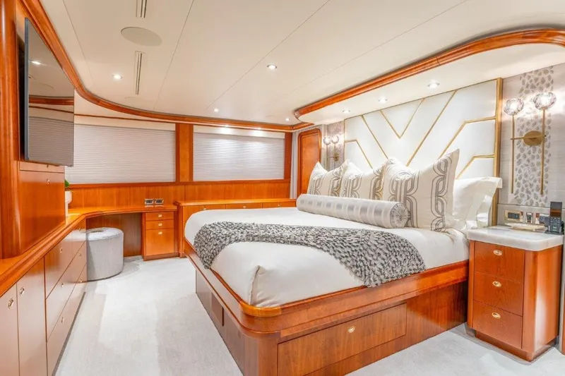 Slide: The Image of Luxurious bedroom interior of 2006 Westport 130 Motoryacht with elegant wood finishes. - 35