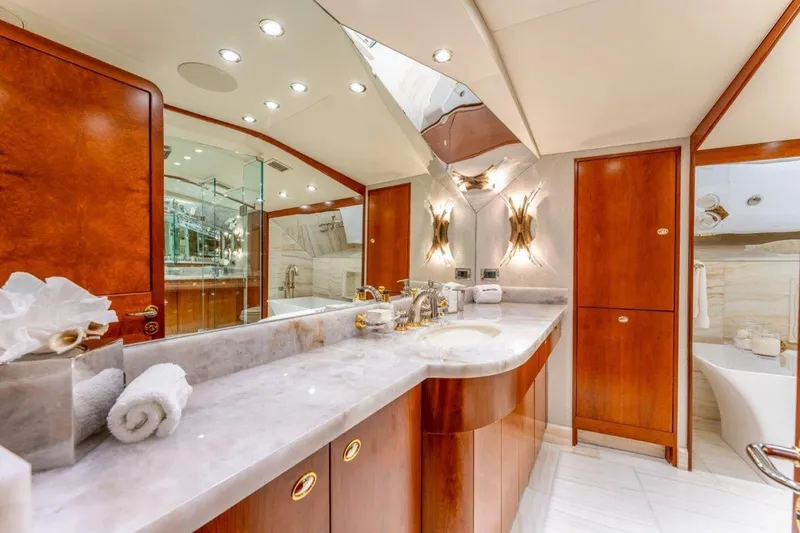 Slide: The Image of Luxurious bathroom in 2006 Westport 130 Motoryacht with elegant wood and marble finishes. - 37