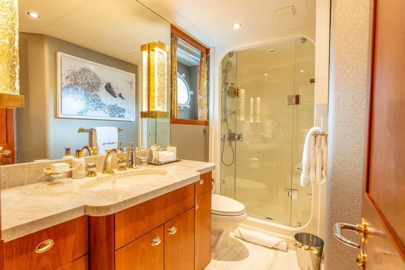 Slide: The Image of Luxurious bathroom in 2006 Westport 130 Motoryacht with elegant fixtures and glass shower. - 44
