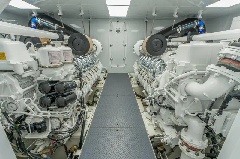 Slide: The Image of Engine room of 2006 Westport 130 Motoryacht, featuring dual powerful engines. - 51