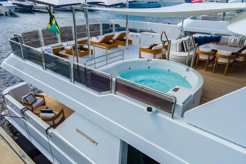 Slide: The Image of Luxurious 2006 Westport 130 Motoryacht with jacuzzi and elegant outdoor seating. - 8