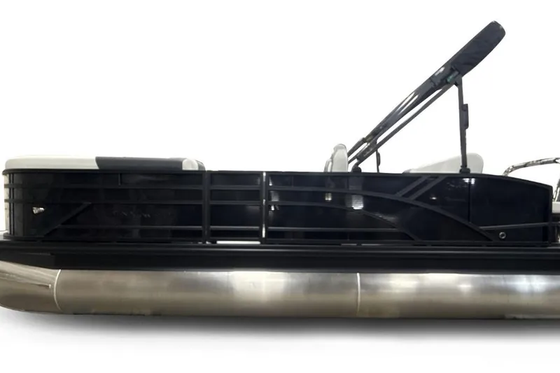 Slide: The Image of 2026 Bennington 22 S1 Swingback pontoon boat, side view with sleek black railing design. - 4