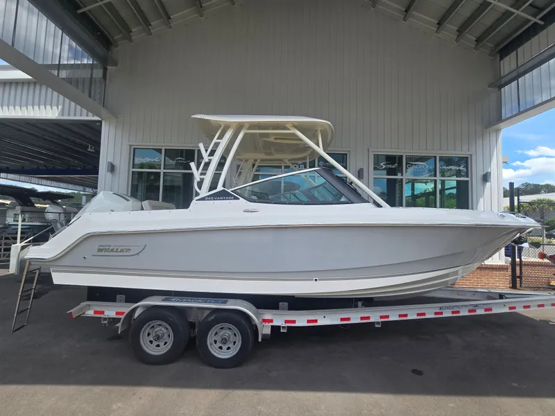 Slide: The Image of 2026 Boston Whaler 240 Vantage on trailer in storage facility. - 0