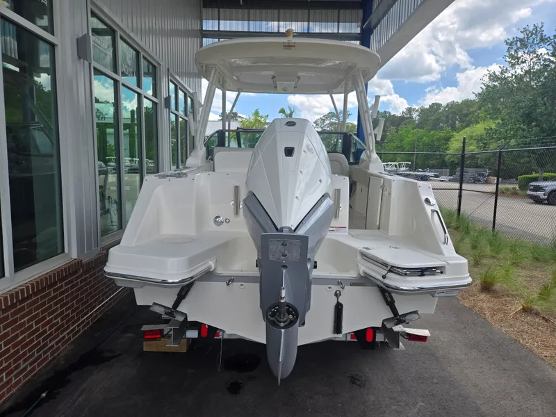 Slide: The Image of Rear view of 2026 Boston Whaler 240 Vantage boat outdoors. - 1