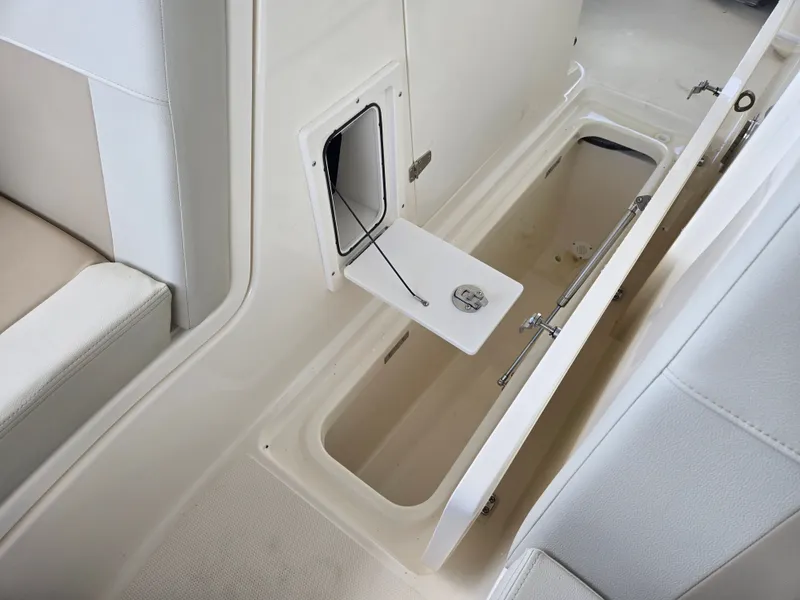 Slide: The Image of Storage compartment in Boston Whaler 240 Vantage 2026 boat. - 16