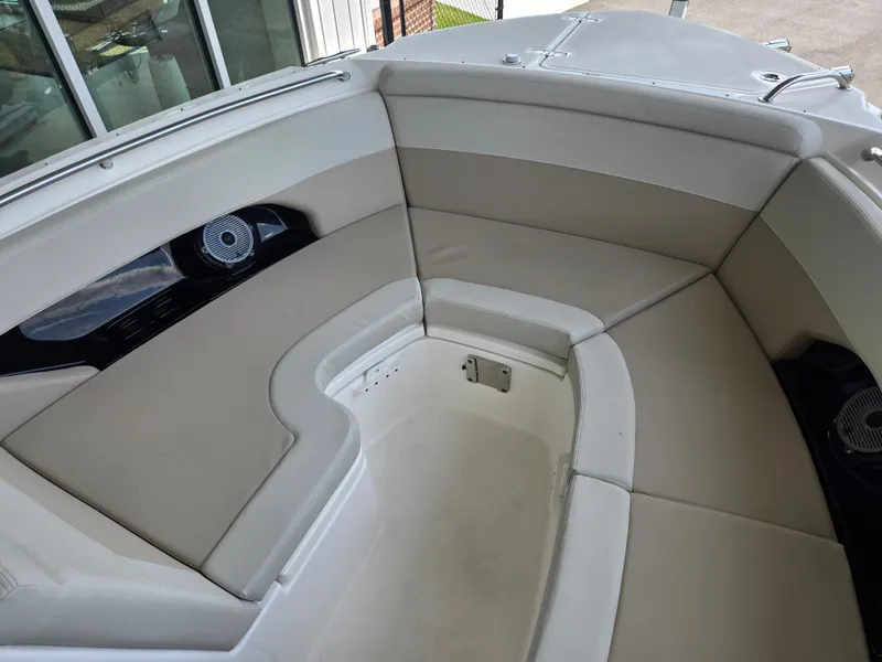 Slide: The Image of Interior of 2026 Boston Whaler 240 Vantage with beige upholstery. - 19