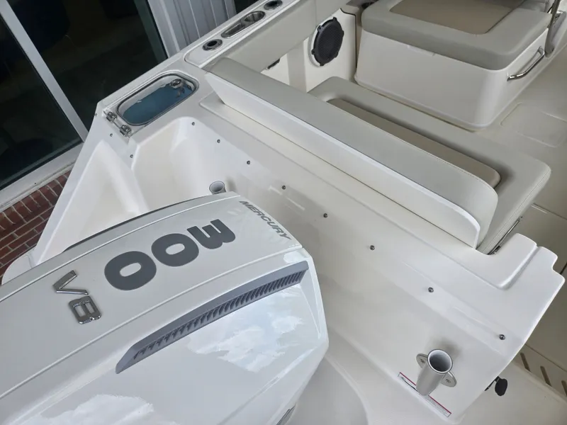 Slide: The Image of Boston Whaler 240 Vantage 2026 with Mercury 400 HP engine. - 2