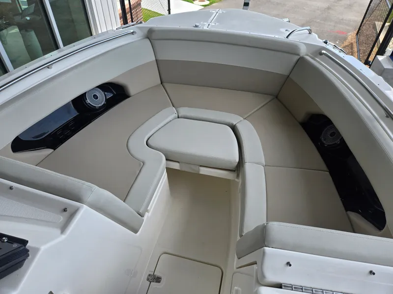 Slide: The Image of Interior of 2026 Boston Whaler 240 Vantage with beige upholstery. - 20