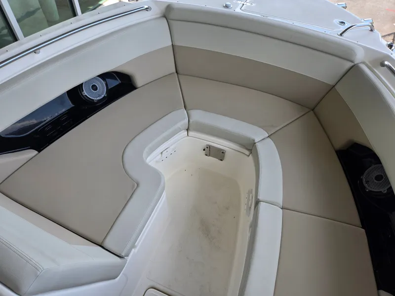 Slide: The Image of Interior of 2026 Boston Whaler 240 Vantage with beige upholstery. - 22