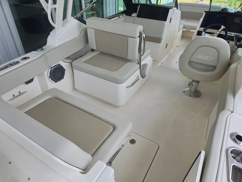 Slide: The Image of Interior of 2026 Boston Whaler 240 Vantage with beige seating. - 3