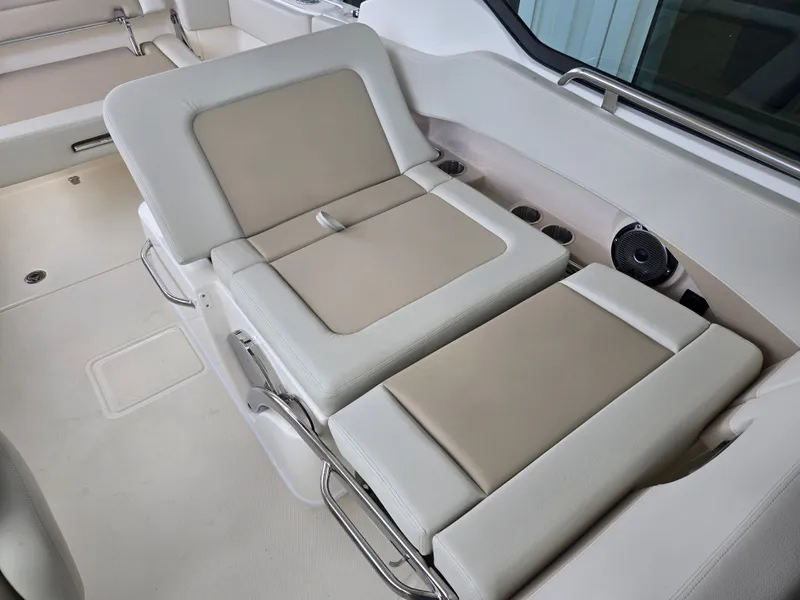 Slide: The Image of Interior of 2026 Boston Whaler 240 Vantage with beige upholstery. - 8