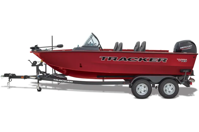 Slide: The Image of 2026 Tracker Targa V-18 WT boat on trailer at dealership, featuring Minn Kota motor. - 3