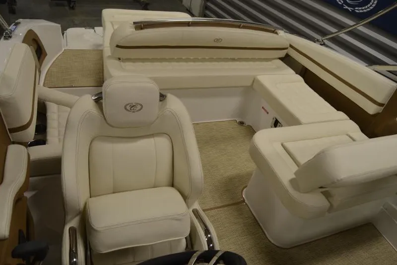 Slide: The Image of 2018 Cobalt R3 boat interior with luxurious cream seating and elegant design. - 10