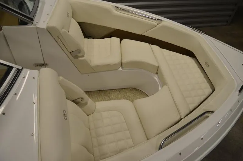 Slide: The Image of 2018 Cobalt R3 boat interior with cream leather seating and elegant design. - 13
