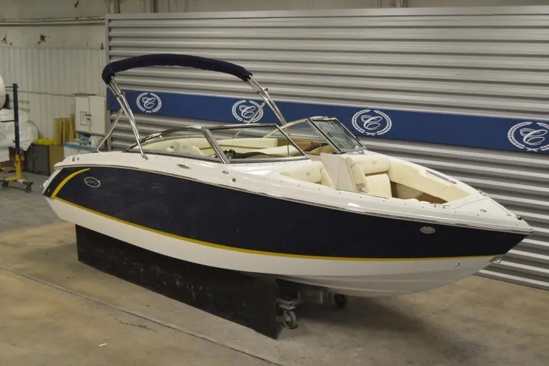 Slide: The Image of 2018 Cobalt R3 boat in showroom, featuring sleek design and comfortable seating. - 6