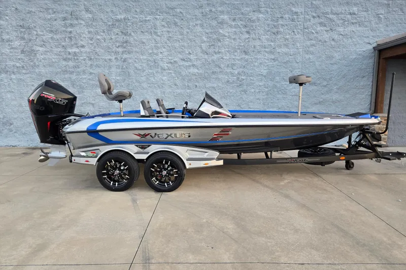 The Image of 2026 Vexus VXs20 boat with sleek design and dual-axle trailer. - 0