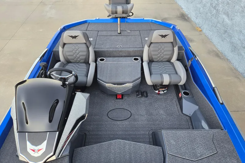 Slide: The Image of 2026 Vexus VXs20 boat interior with gray seating and modern console design. - 3