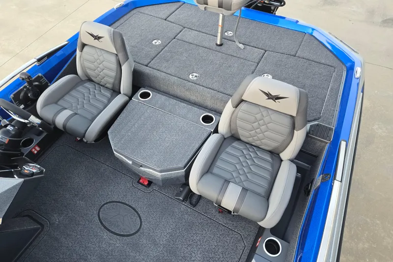 Slide: The Image of 2026 Vexus VXs20 boat interior with gray seats and blue accents. - 7