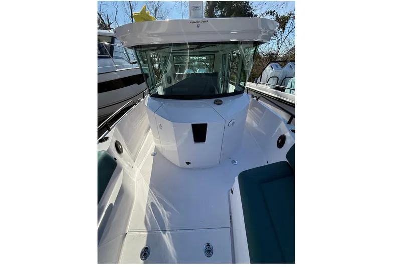 Slide: The Image of Interior of 2023 Axopar 28 Cabin with modern upholstery. - 13